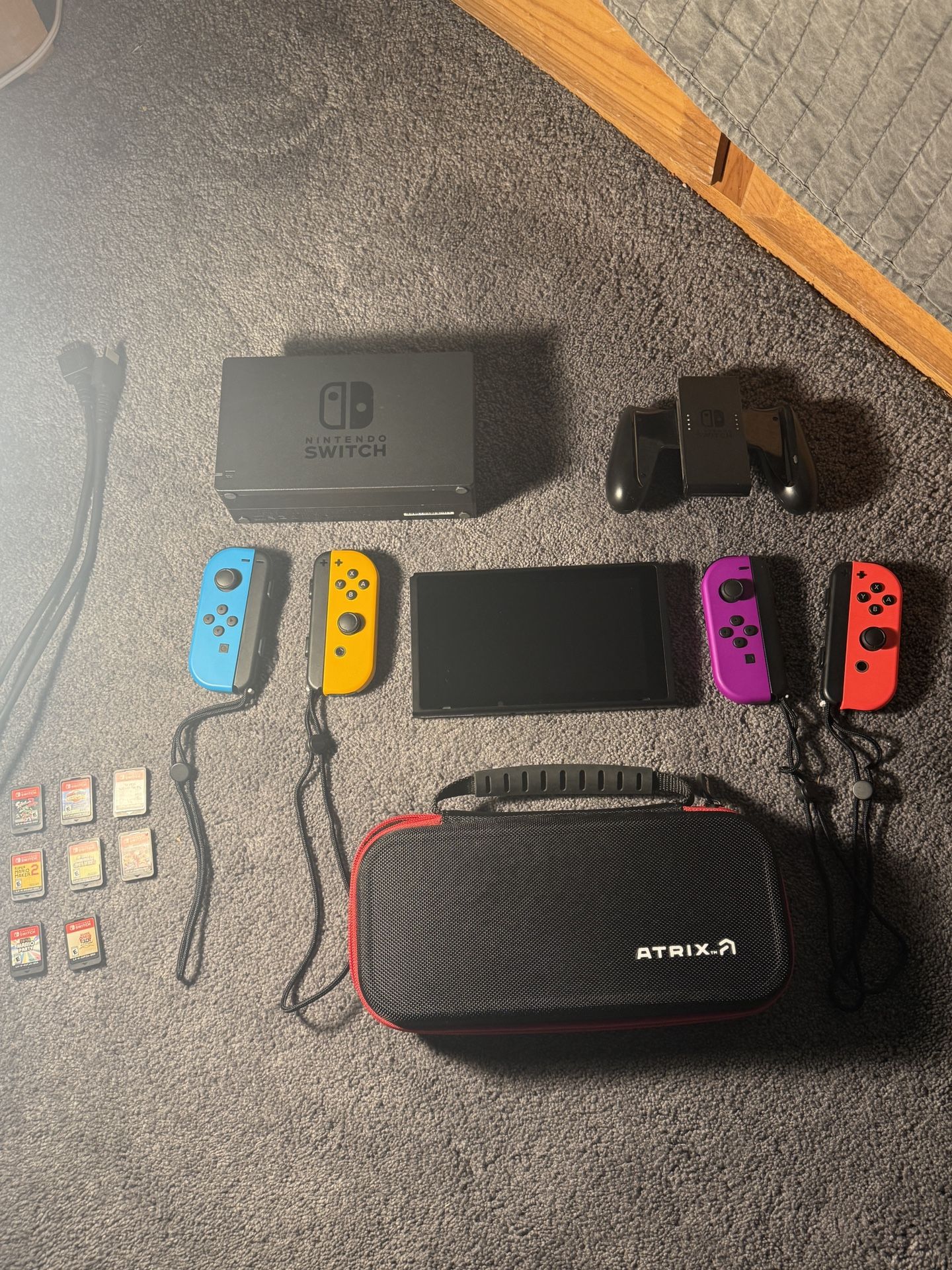 🎮 Nintendo Switch Console + 8 Popular Games + Extra Joy-Cons + Case – Complete Bundle! 🎮