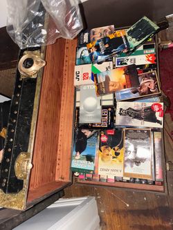 VHS tapes about 100 of them all different types inside a chest