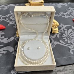 Imitation pearl necklace, bracelet, and earring set