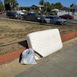 Free Twin Mattress and Bag Of Women's Shoes.