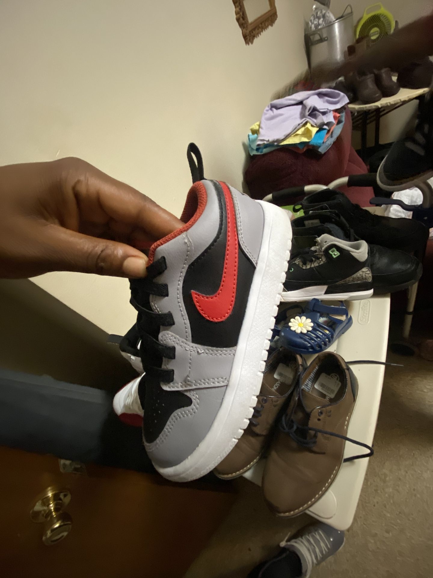 black, red, grey low jordan 1’s