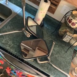 stainless steel "swing-away" style side-view mirrors commonly used on trucks and SUVs from the 1950s through the 1980s.Similar mirror assemblies were 