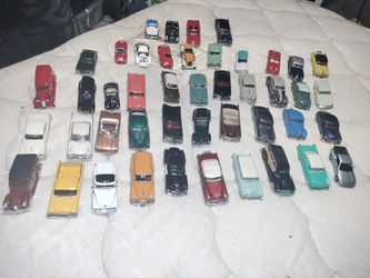 Collectible Dolls And Cars