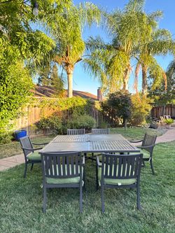 Large outdoor patio dining table set with 6 chairs