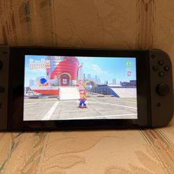 Nintendo Switch 1 - All Black With Mario Odyssey