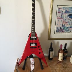 Jackson King V  Electric Guitar Ferrari Red, comes with a Road Runner gig bag & matching shoulder strap. (LIKE NEW)