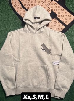 Light oat essential hoodie