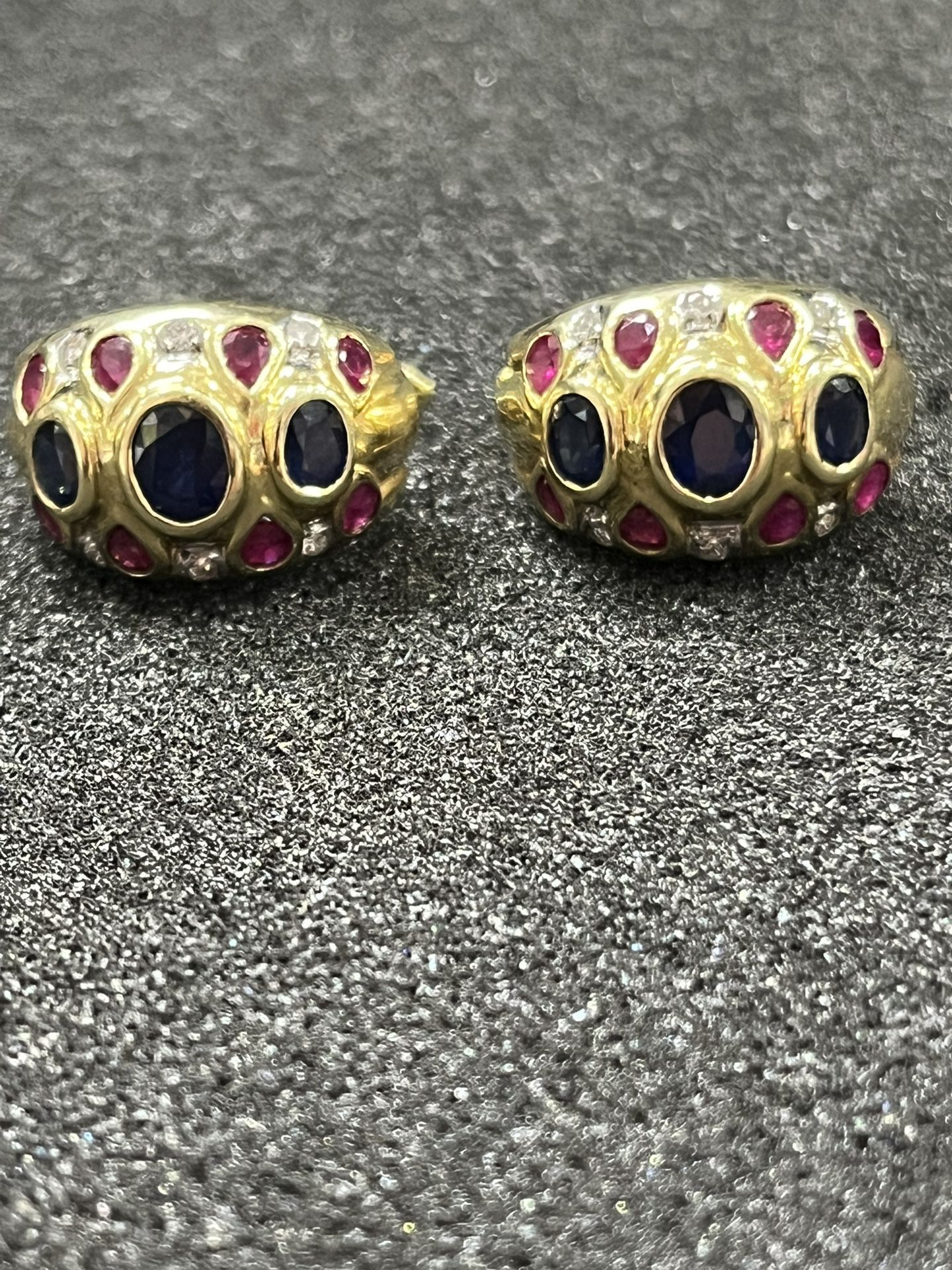 14k Gold earrings 9.2 grams with diamonds  Sapphire and Ruby stone