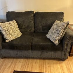 (2) Brown Love Seats With Pillows