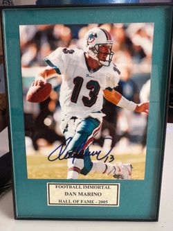 Dan Marino Hall of Fame autographed picture with authentication sticker on the back