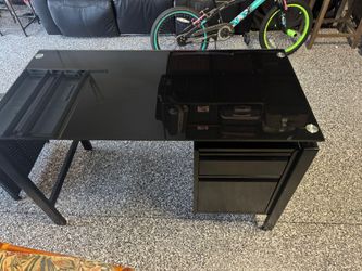 Desk with glass top and drawers