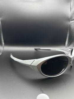 Silver Oval Frame Sunglasses with Dark Lenses