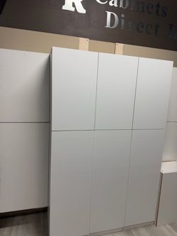 $300 TAKES ALL! White Frameless Pantry & Storage Cabinets – Showroom Clearance