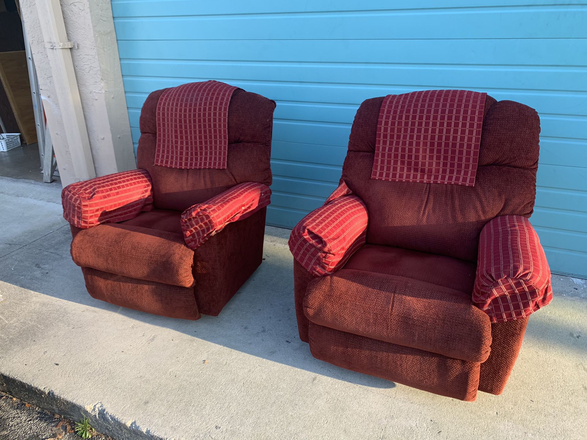 Pair of red lazy boy recliners