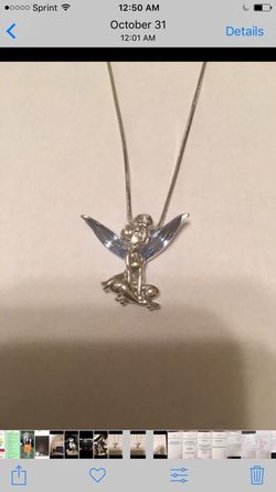 Silver Tinkerbell with silver chain. Crystal Wings. Never worn, bend new. Original packaging.