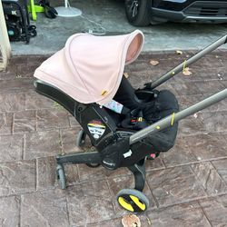 Doona Car seat, Stroller, Base, And Bag Attachment