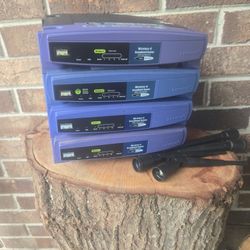 (4) Linksys WRT54 Routers