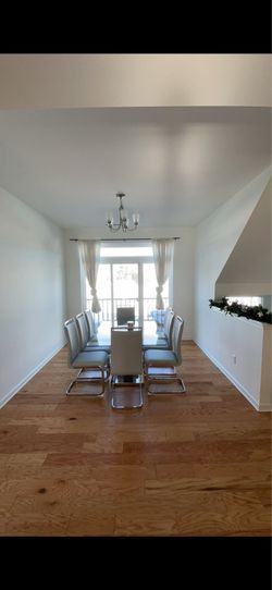 Modern glass dining table with chairs