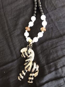 Bead chain with horse pendant