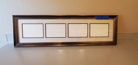 Frame with matting 4 -5x7 openings