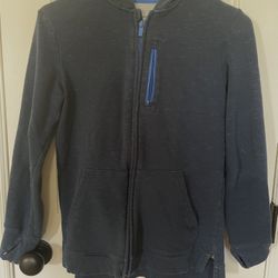 Nice Used “All In Motion” Blue jacket with hood, zippers, pockets,thumb opening at cuffs. Lg 12/14