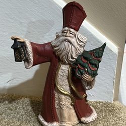 Christmas Santa figure Ceramic  Old World holding tree 8” tall  decor