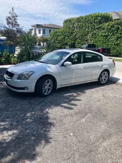 2004 Nissan Maxima runs/drives AC 258k.