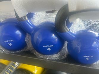 New set of kettle bells a 20 pounder 15 pounder and 10 pounder