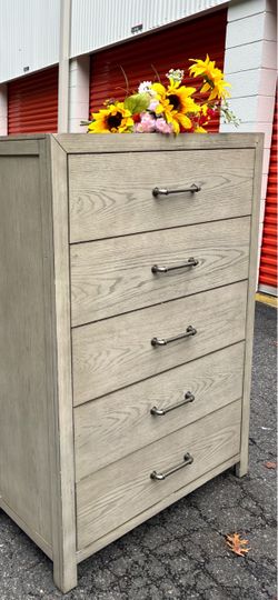 Modern tall chest with big drawers . Drawers sliding smoothly