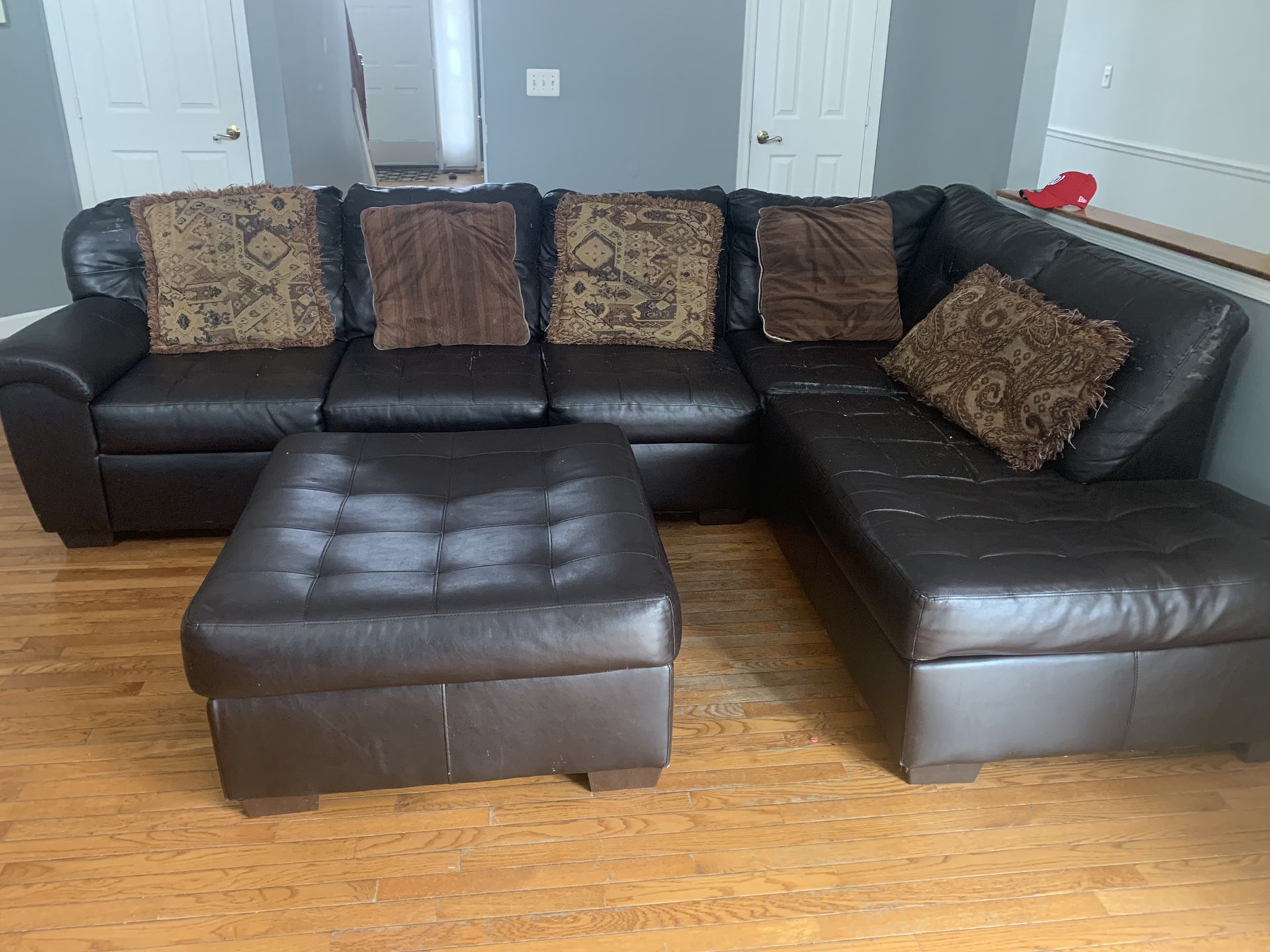 Leather seat sectional with Ottoman