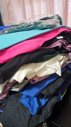 $55 for all men and women tshirts all NEW total 66 tshirts size small,medium, large ,xlarge ,2xl