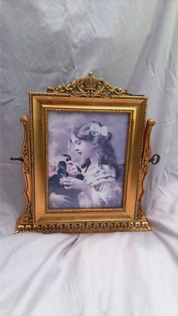 Vintage decorative picture frame in gold color