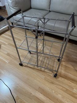 Silver rolling cart with 3 shelves