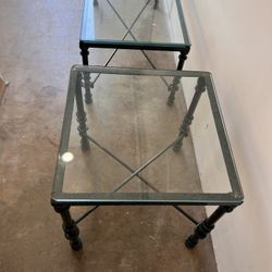 2 Beautiful Metal  Coffee Tables with glass top  1 Table Is 20x20 Inch The Other One Is 40x20 Inch Great Conditions Asking 20 Dollars For Both 