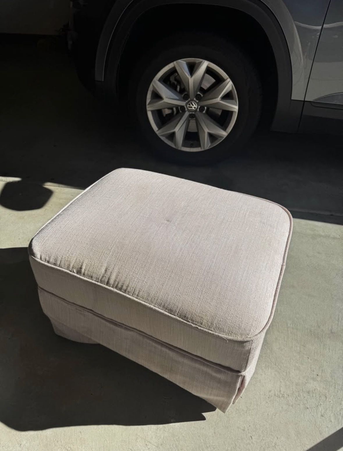 Light Pink Swivel Ottoman