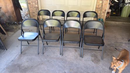 8 Black folding chairs