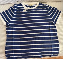 This striped top is the Madewell Perfect Crewneck Baby Tee in Cool Navy, featuring a white ribbed collar and sleeve cuffs. [1, 2] * Material: Made fro