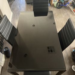 Glass table with 4 chairs! 