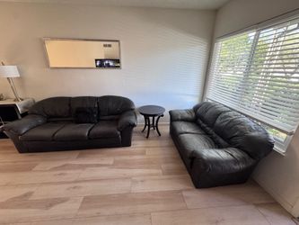 Leather couch and love seat.