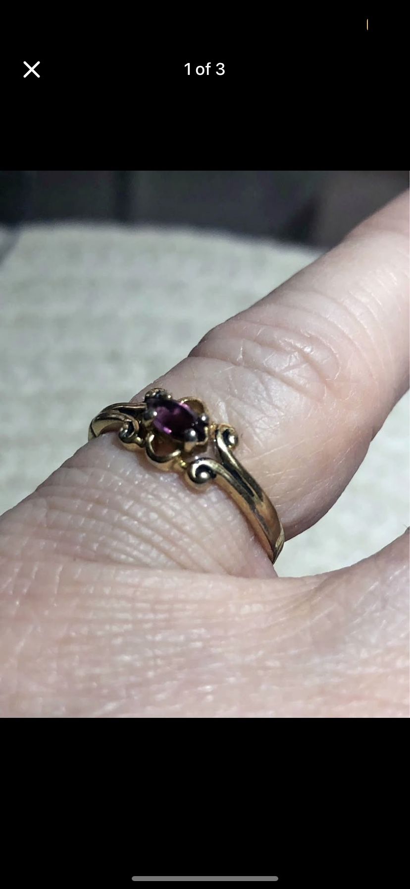 A small Marquis-cut amethyst graces this vintage ring. Size 6 1/2.