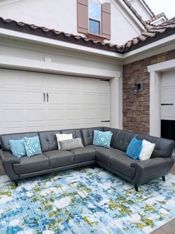 Gray Leather L shaped Sectional Couch