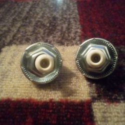 The image shows a knock sensor, an essential component in modern internal combustion engines. It detects engine knocking or detonation, which is a met