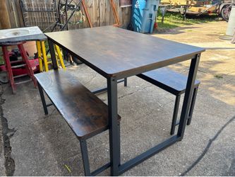 Set of table with two bench seats.
