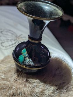 Little handcrafted three footed vase