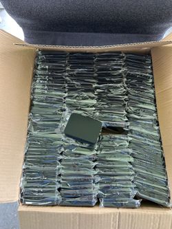 100 metal tins, as pictured