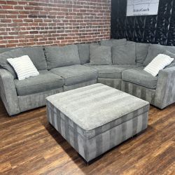 Free Delivery-Maceys gray 4pc sectional sofa couch + storage ottoman retails 2478
