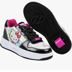 Hello Kitty Heelys  Size 4 Yound girls.