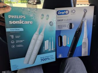 2 Philips Sonicare and 1 Oral B Electric Toothbrushes