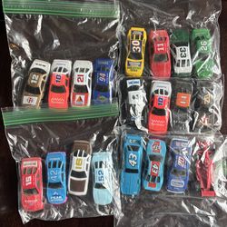 Late 80’s and early 90’s race car, card and stand sets