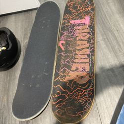 Two Boards A Helmet And Two Sets Of Wheels With One Set Of Bearings 